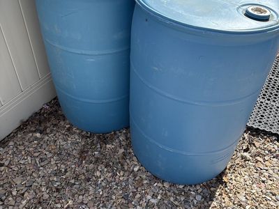 Two 55-Gallon Blue Plastic Barrels - Rain Barrels / Storage Drums