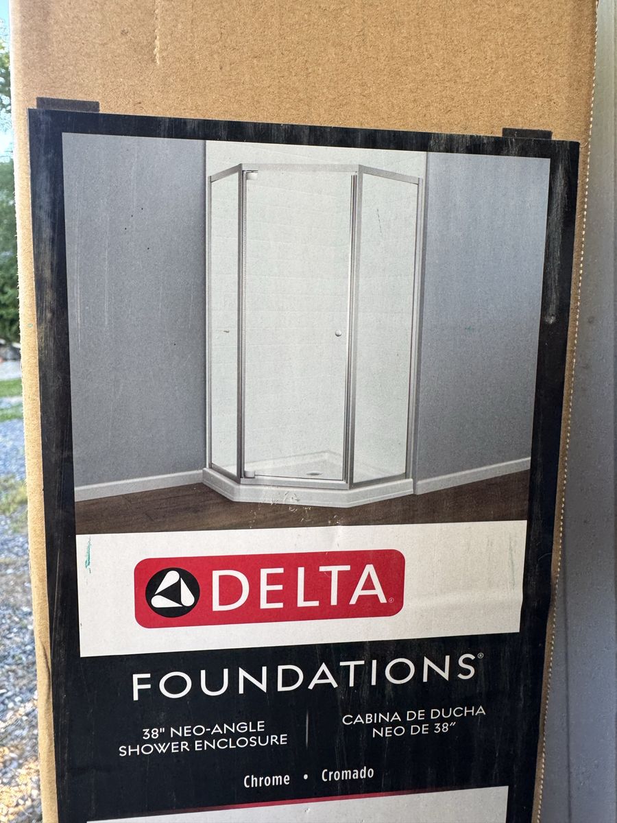 Delta glass shower enclosure