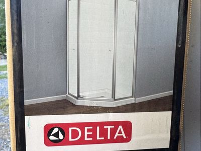 Delta glass shower enclosure