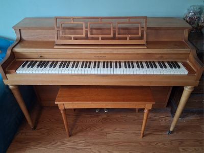 Cable-Nelson piano with bench