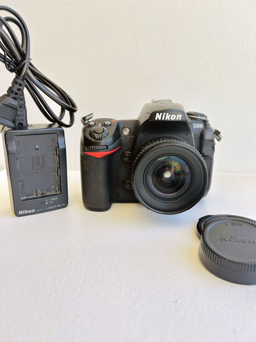 Nikon D300 DSLR FX Camera with 20mm f/2.8 Lens and Charger with 2 memory cards