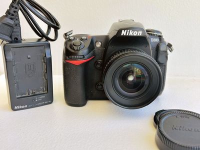 Nikon D300 DSLR FX Camera with 20mm f/2.8 Lens and Charger with 2 memory cards