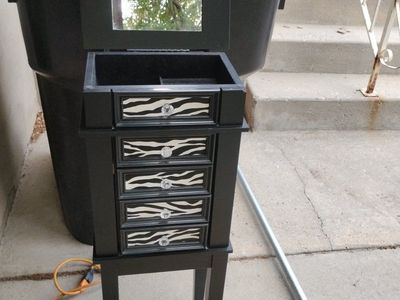 Black Standing Jewelry Armoire with Zebra Print Drawers and Mirror