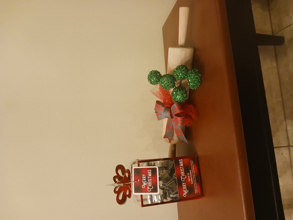 Christmas cookie cutters and rolling pin.