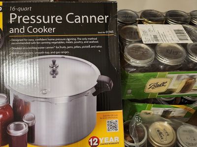 Pressure Canner and Cooker and mason jars and lids