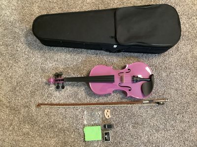 Diorrin full size purple violin with hard case, bow, and accessories.
