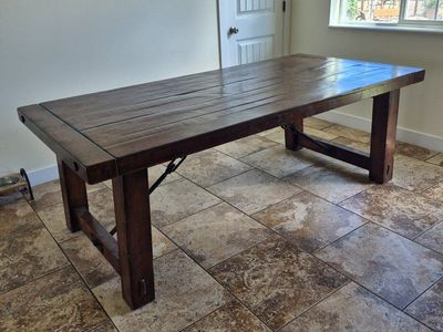 Rustic 7'-2" x 42" with two 18" leafs.
Solid wood construction with metal accents