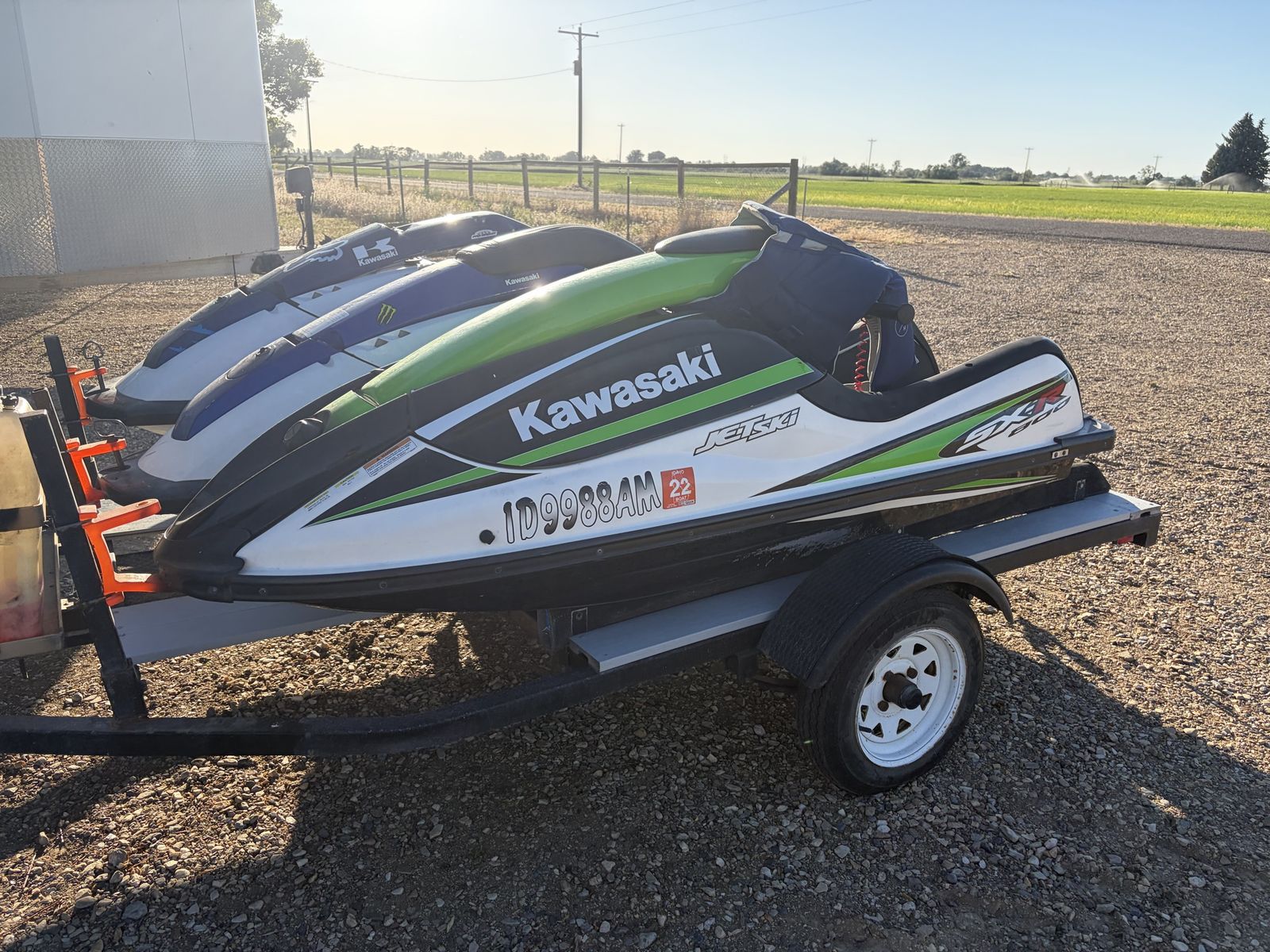 Kawasaki Jet Ski STX-15F Personal Watercraft - White/Green/Black, on Trailer