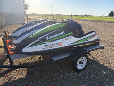 Kawasaki Jet Ski STX-15F Personal Watercraft - White/Green/Black, on Trailer