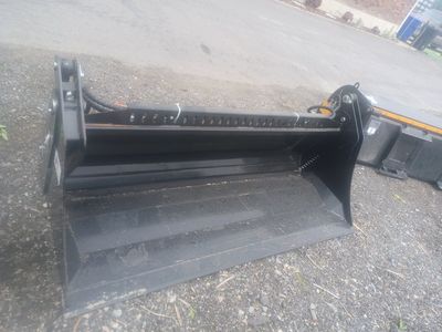 Heavy duty 72 in 4 in one skid steer bucket