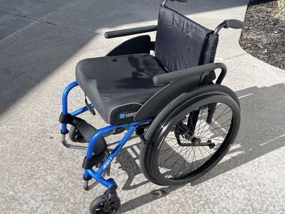 TiLite Lightweight Wheelchair with SmartDrive Power Assist bright blue TiLite Aero T ultralightweight rigid manual wheelchair