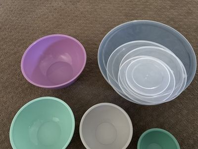 Mixing bowls with lids.