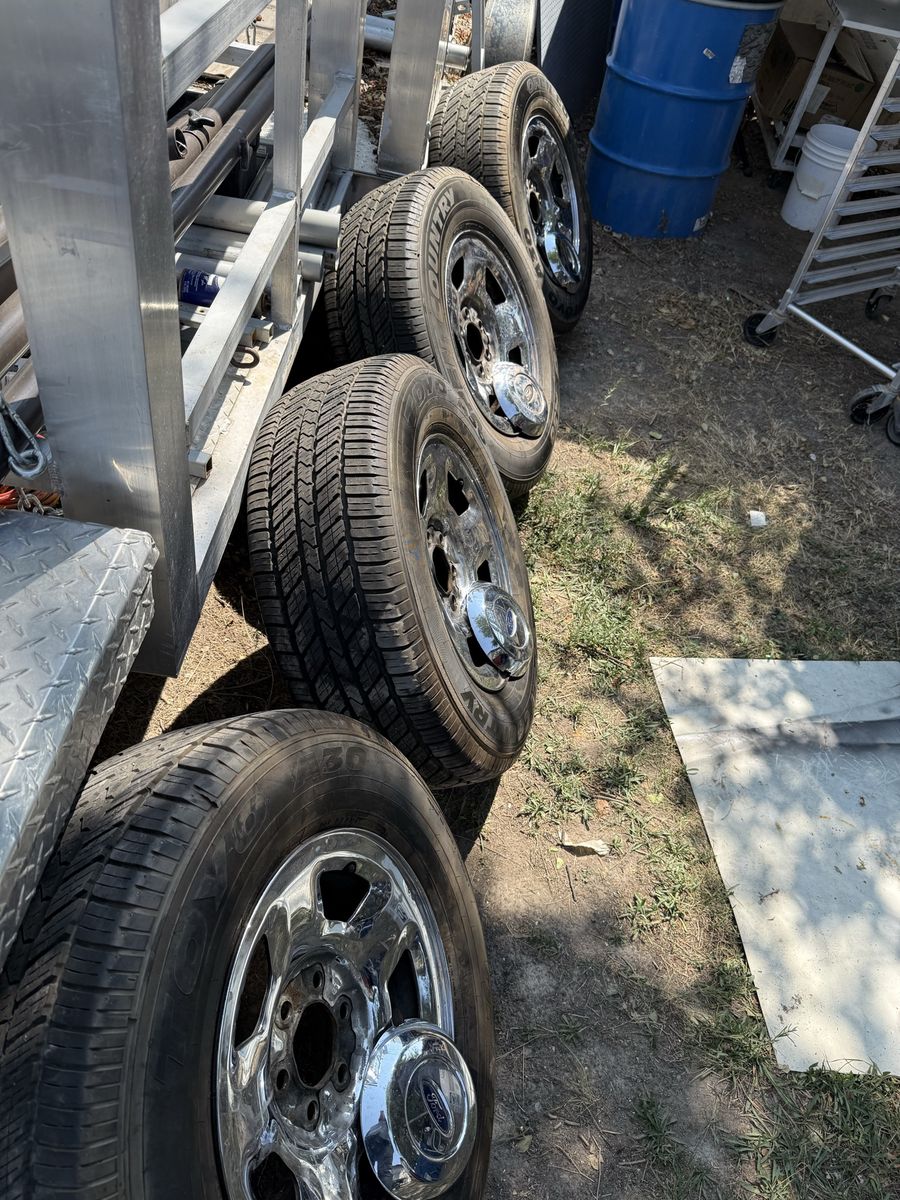 Set of 4 Chrome Ford Wheels with Toyo Tires