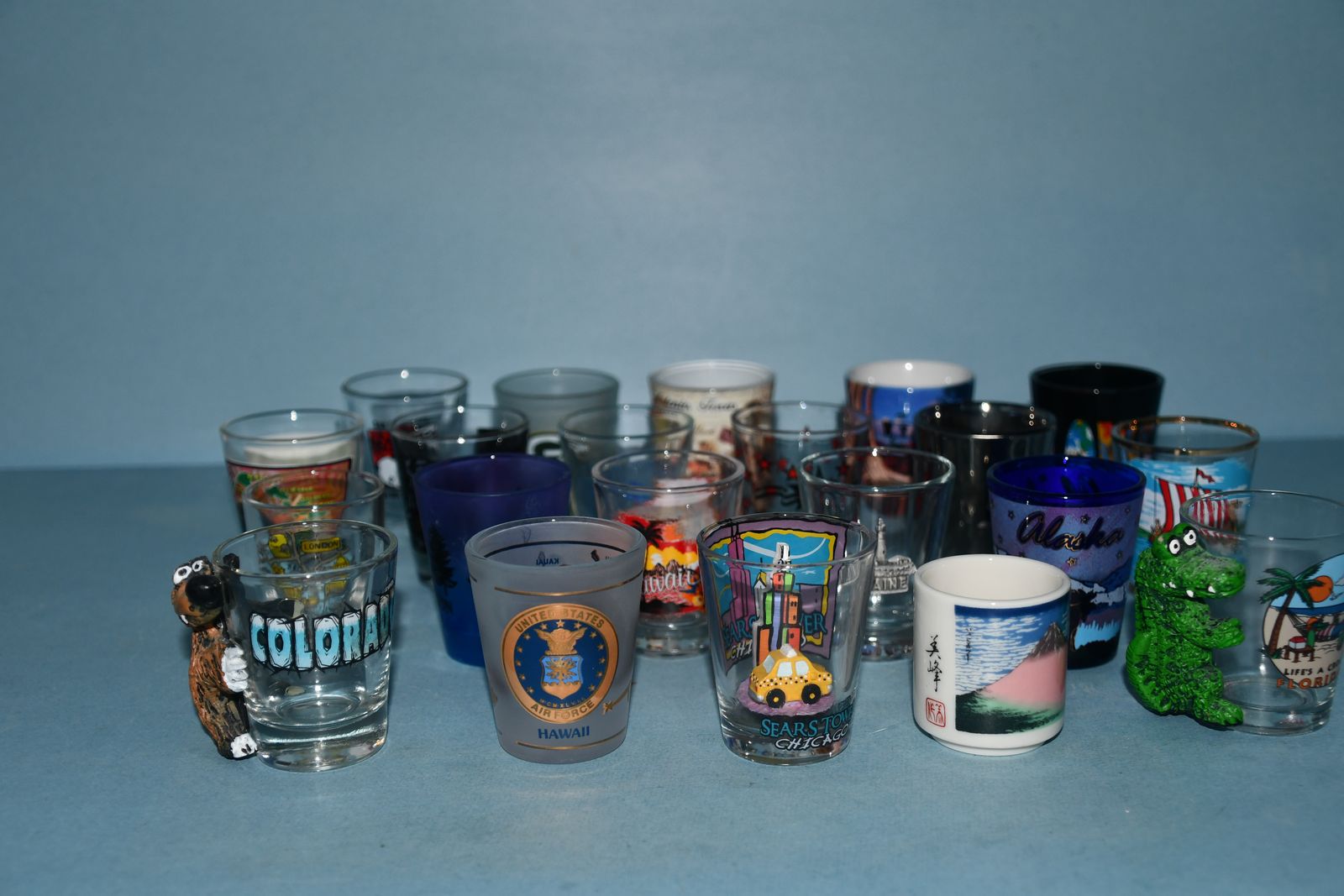 21 MAN CAVE SOUVENIR SHOT GLASSES ~ NO CHIPS ~ CLEAN ~ ASSORTED SIZES, SHAPES & COLORS ~ SET A