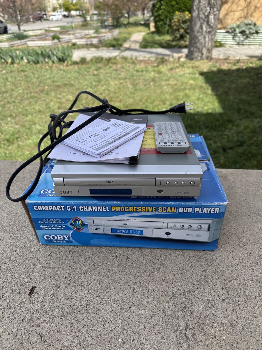 Coby compact 5.1 Channel Progressive Scan DVD Play