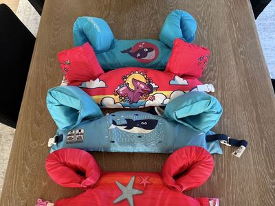 Kids Swim Life Vests & Puddle Jumpers $5