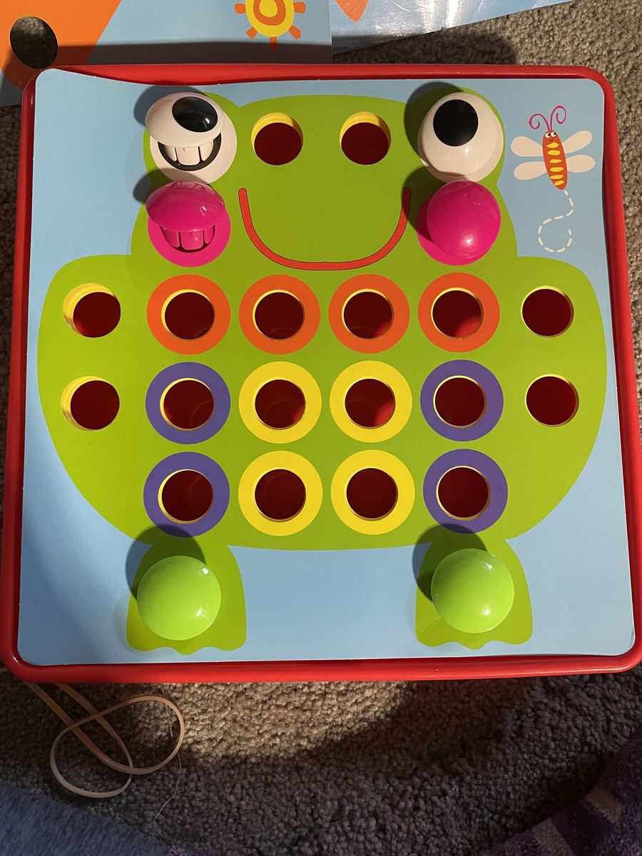 Peg Board Toy with multiple patterns.