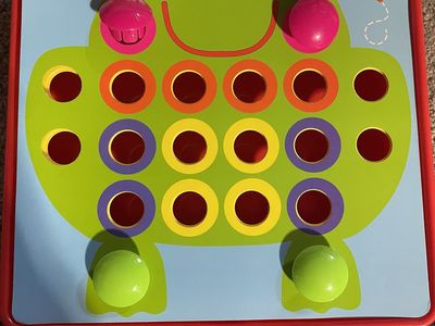 Peg Board Toy with multiple patterns.