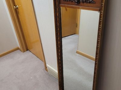 tall decrotive wall mirror
