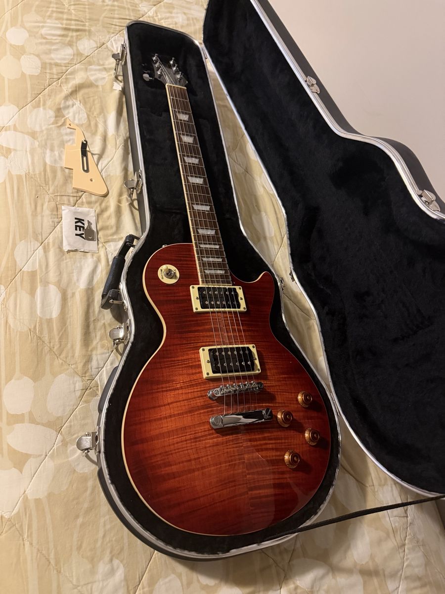 Epiphone Les Paul Electric Guitar - Sunburst Finish, Locking Hard Shell Case Included