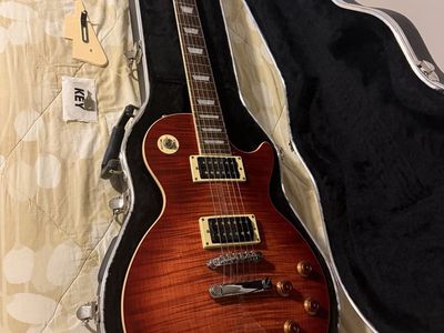 Epiphone Les Paul Electric Guitar - Sunburst Finish, Locking Hard Shell Case Included