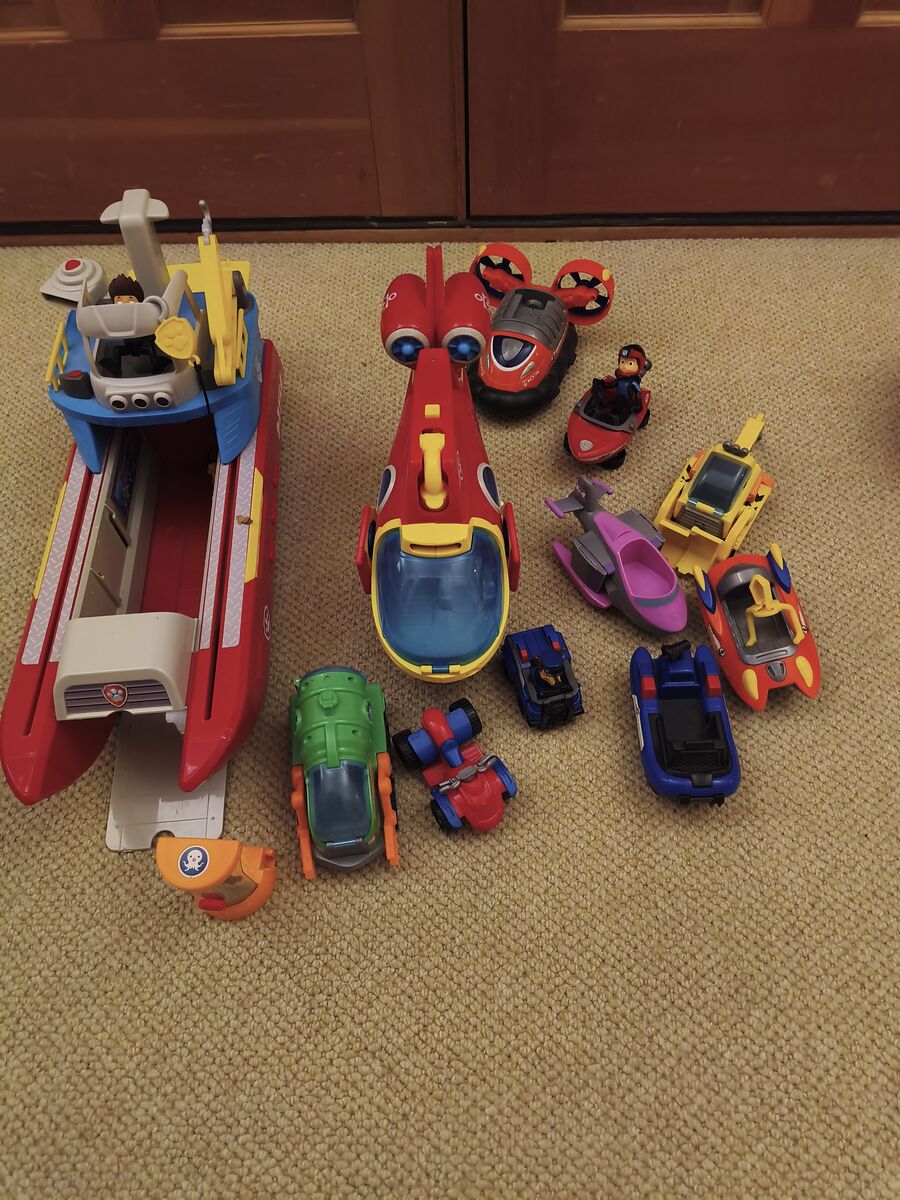 Paw Patrol - Sea Patrol Boat, helicopter/jet/sub?, and assorted trucks