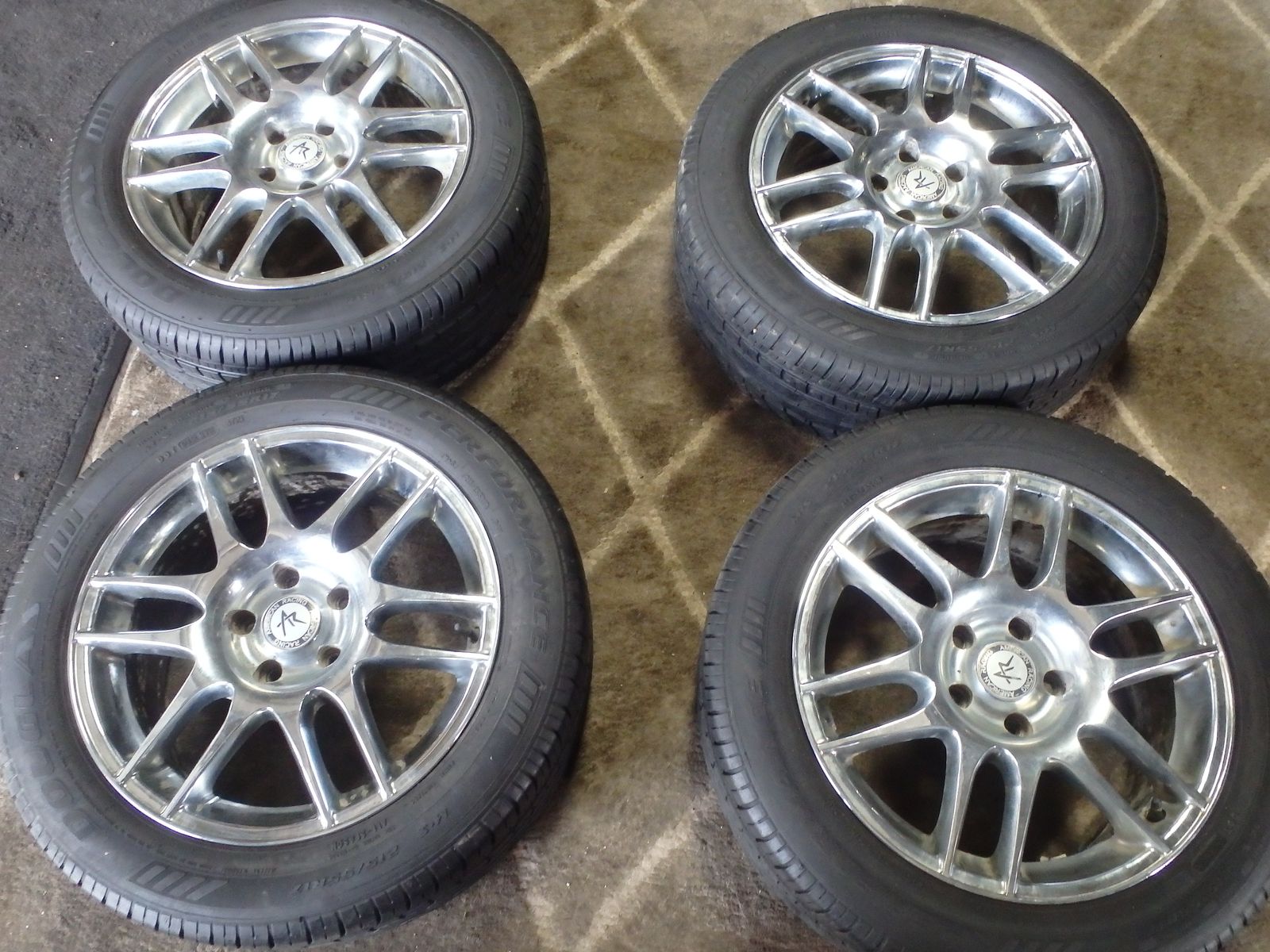 SET OF USED 17" AMERICAN RACING 5X4.5 AND TIRES 215/55R17