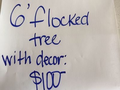 6’ flocked Christmas tree with decorations