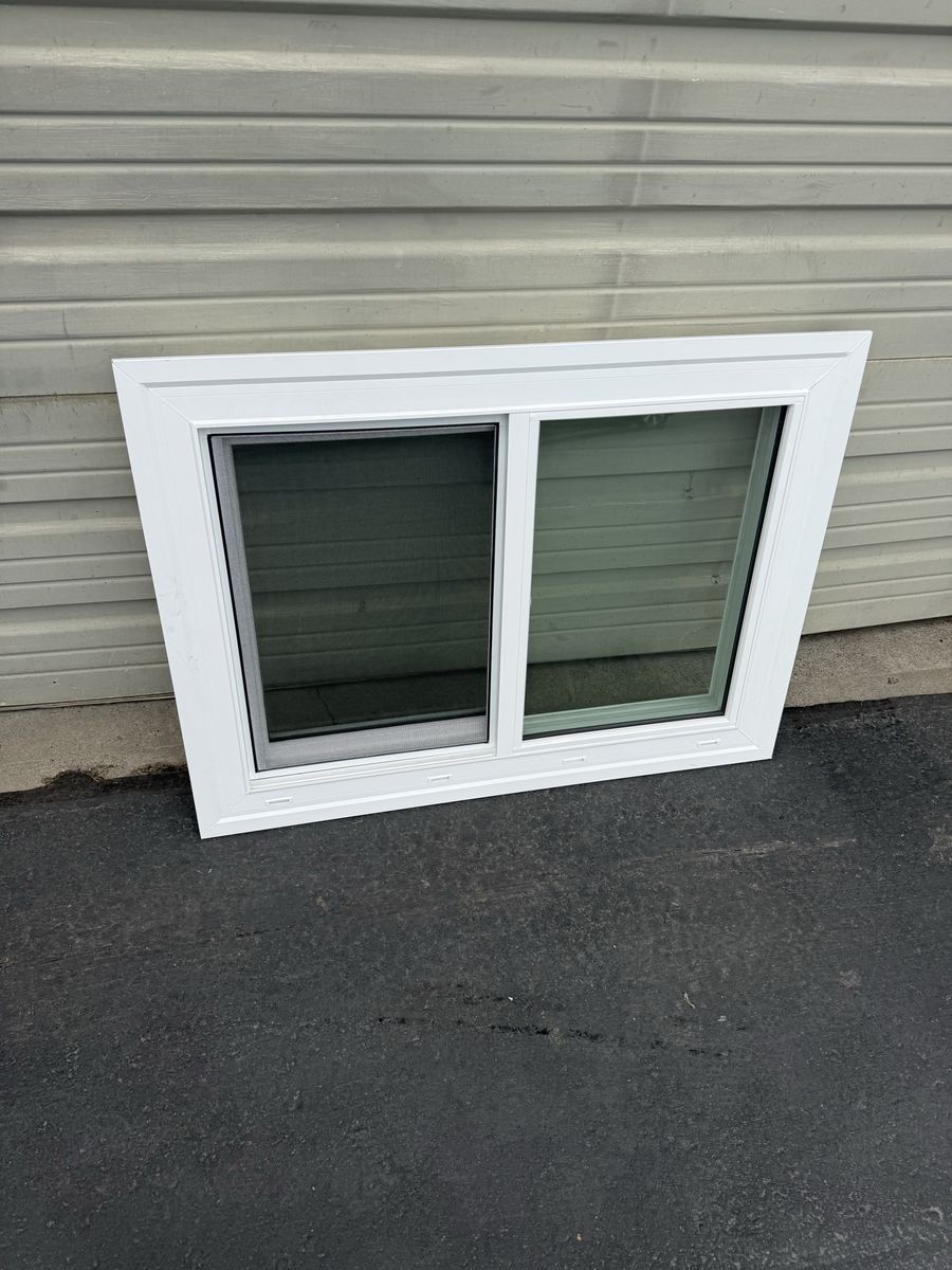 White Vinyl Sliding Window