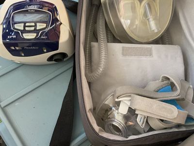 Smallish ResMed auto cpap with travel bag and optional humidifier under 9000 hours on it runs quite, has a dc plug option