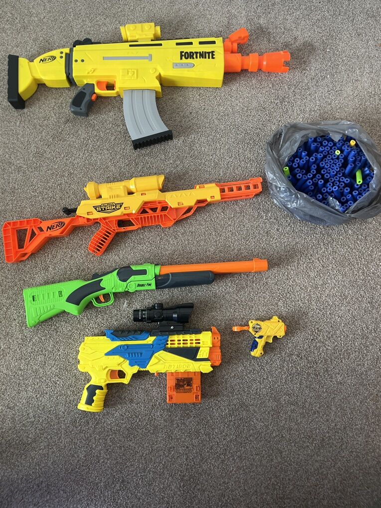 200 Nerf Bullets, 5 Nerf Guns, 2 Scopes, 2 Mags