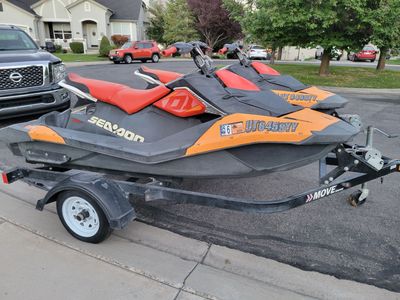 A pair of 2018 Sea-Doo Spark Trixx 3 Up