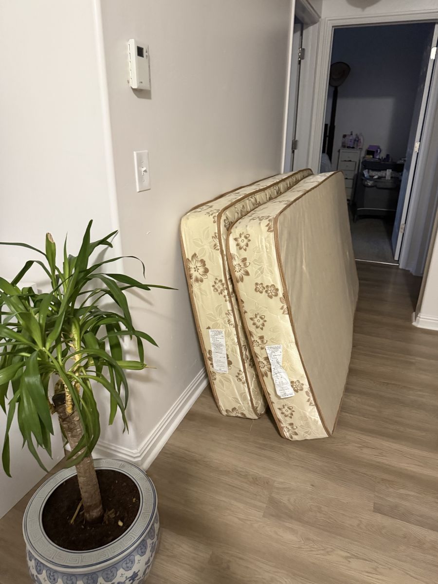 Twin Mattress from spare room. Excellent condition pet & smoke free home