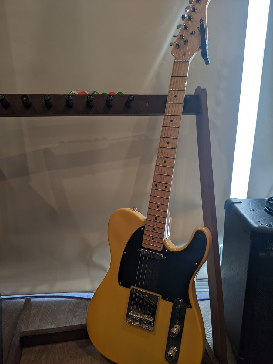 Yellow Telecaster with amp