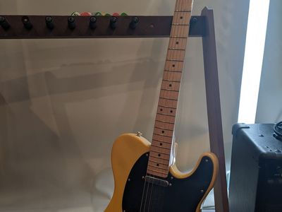 Yellow Telecaster with amp
