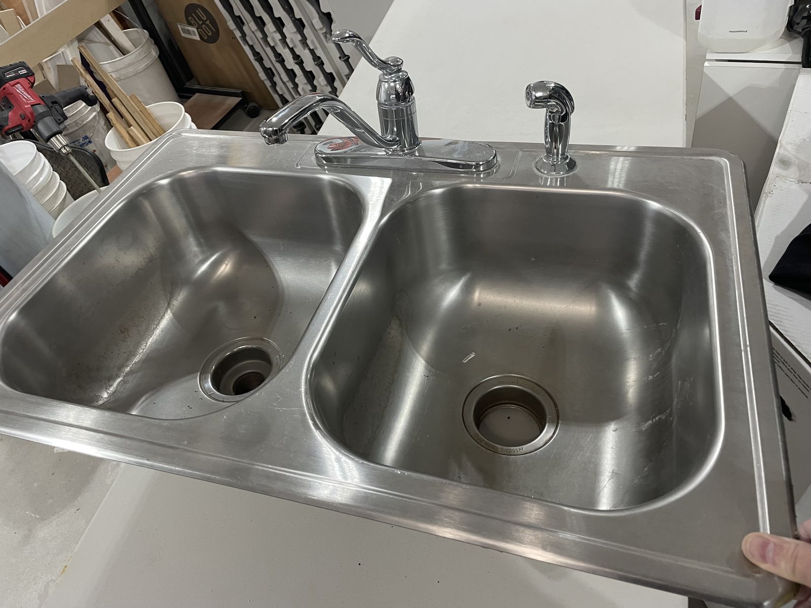 Stainless steel sink with faucet