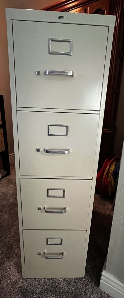 Four drawer metal filing cabinet