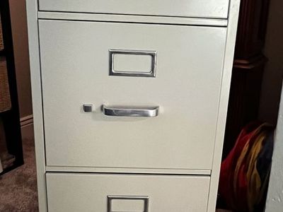 Four drawer metal filing cabinet