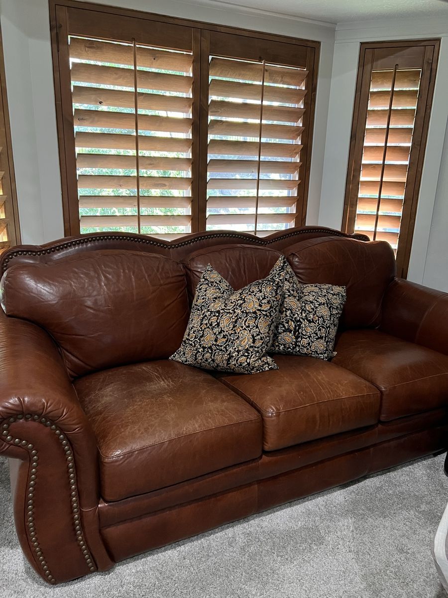 Leather sofa with matching ottoman