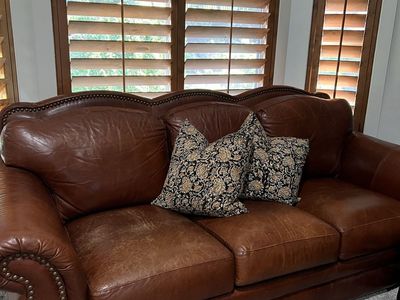 Leather sofa with matching ottoman