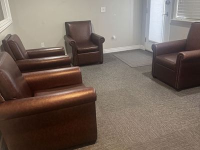 Brown Faux leather club chairs (5) $60
