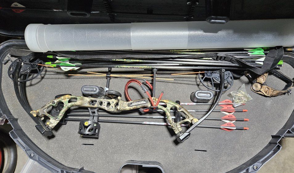 Bear Cruzer Lite Right-Hand bow and plus a dozen extra arrows plus 2 triggers and extras w target.