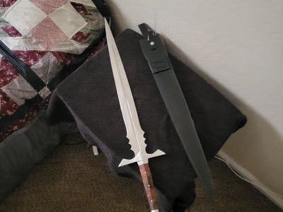 Hand Forged Carbon Steel Sword with Leather Sheath.