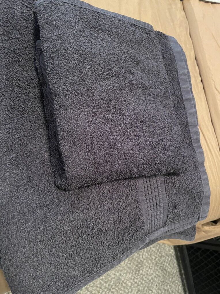 Black bath towel and black hand towel