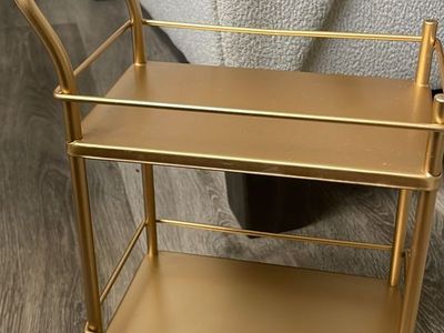 Small gold tone metal bar cart