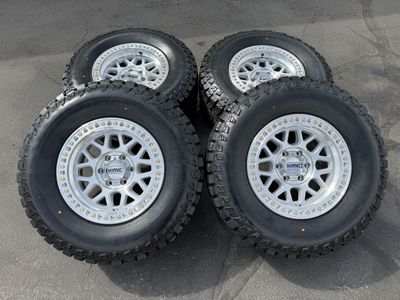 New Silver KMC KM549 GRS 6x135 LT295/70r17 RT Ford F150 wheels and tires 6 lug Expedition