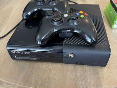 Xbox 360 Slim Console Bundle with 2 Controllers and 4 Games
