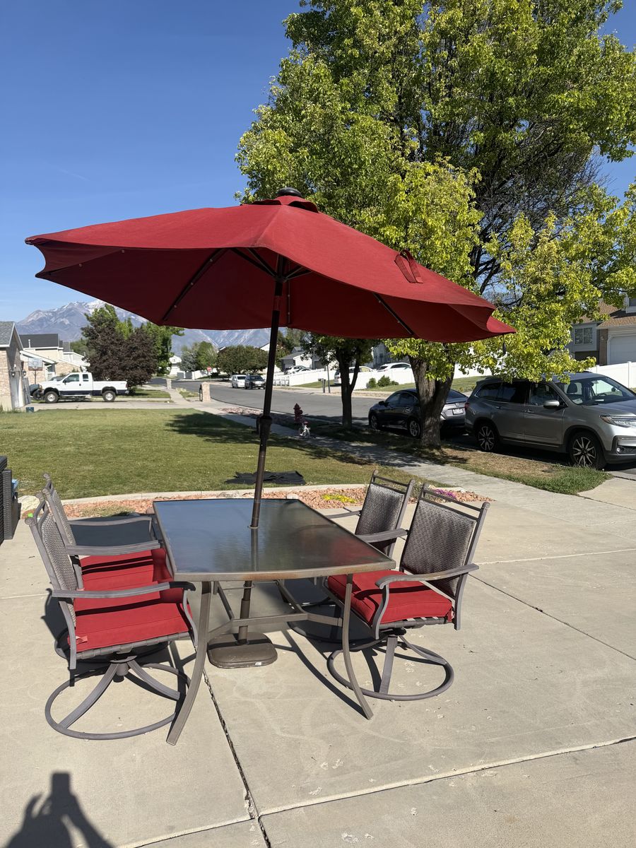 6-Piece Outdoor Patio Dining Set w/ Swivel Chairs + Solar Light Umbrella