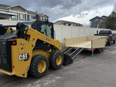 Skid Steer Bobcat and Dump Trailer Combo for Rent - Wheeled Skid Steer