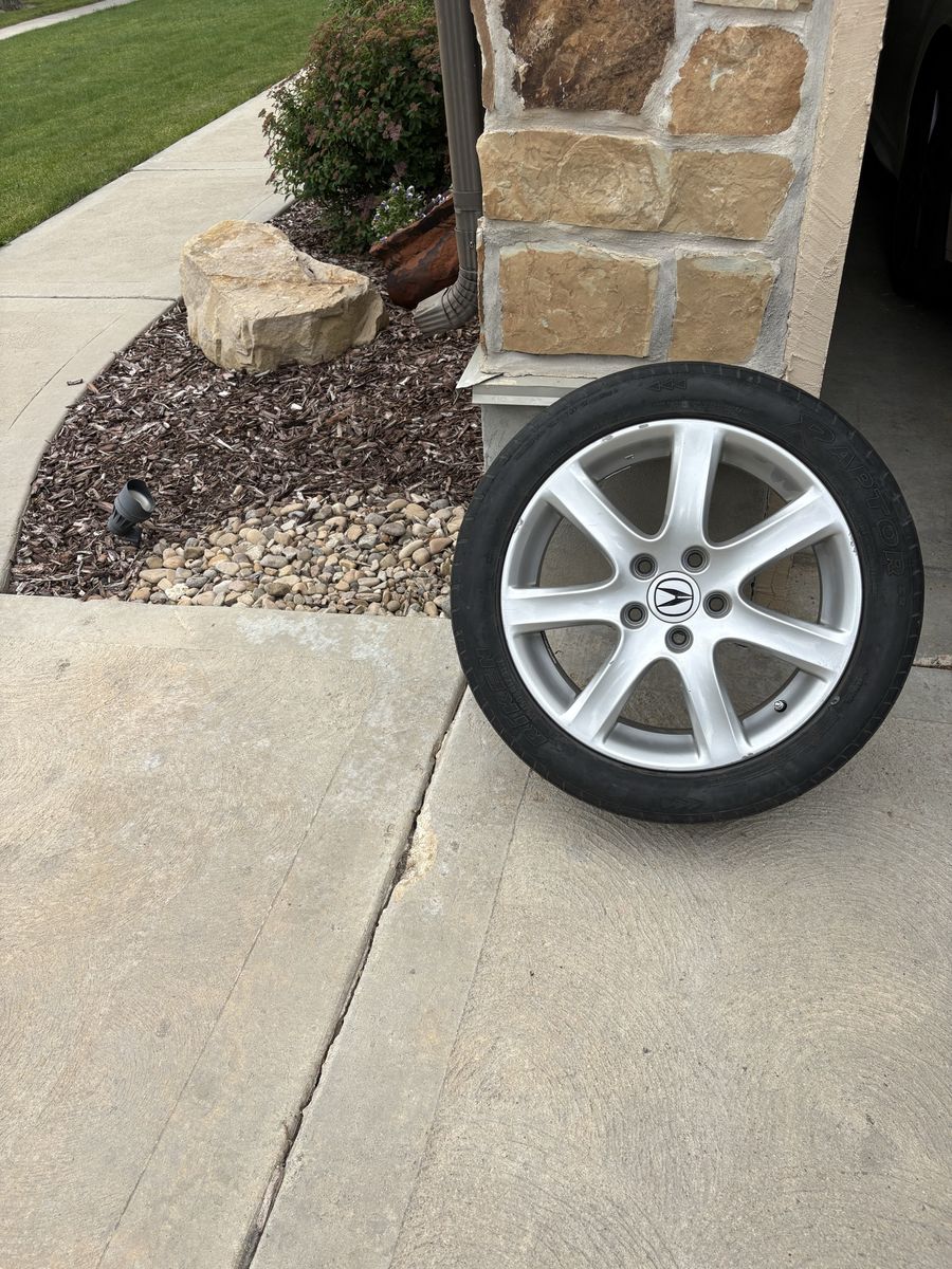 Four Acura Silver 17" 5-Spoke Wheel with used tires